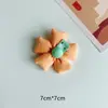 2023 nuevos accesorios para el cabello de niños coreanos flor de tela banda de goma con forma de corazón cuerda para el cabello accesorios al por mayor