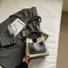 Bolsa de Mão Transfronteiriça para Mulheres 2026 Nova Moda Outono e Inverno Bolsa de Ombro Tendência com Acabamento de Luxo para o Dia a Dia e Bolsa Saco Transversal