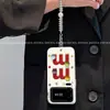 Funda de teléfono aplicable para xiaomi18pro18promax de dibujos animados con pulsera para mujer, colorida, con granos de chocolate