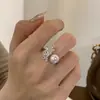 Anillo de oro real de 18k bañado con circonita y perla en forma de gota de agua, anillo de índice abierto de nicho de alta gama, anillo simple y versátil