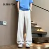 Pantalones rectos de color liso con caída y sensación de alta calidad, bolsillo curvo, pantalones casuales forrados de polar para hombre, otoño, pantalones casuales de traje extralargos