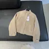 Atacado de roupas femininas de comércio exterior estilo europeu e americano primavera novo gola alta zíper jaqueta casaco textura camurça 3046071