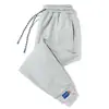 Calça Cropped Masculina Casual de Algodão Puro com Amarração Moda Esportiva Calça Legging Cor Sólida Versátil Calças Tendência para Adolescentes Explosiva