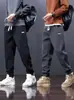 Venta al por mayor del fabricante Pantalones Jogger Casuales Ajustados Nuevos para Hombre Marca de Tendencia Ins Pantalones Deportivos Sueltos Largos con Puño de Tendencia