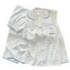 Pijamas de mujer al por mayor para primavera y otoño, con lindos diseños de dibujos animados, diseños a cuadros, motivos de nubes y mangas largas, adecuados tanto para usar en interiores como en exteriores