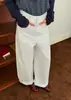 Calça casual de corte tridimensional de cintura média a alta, tendência 2026, estilo workwear, perna larga para mulheres no outono, com caimento solto e fluido.