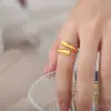 Anillo índice con pigmento dorado para hombres y mujeres, anillo abierto de moda de nicho, personalidad, estilo frío simple