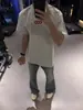 Nueva camiseta bordada de manga corta estilo americano para calle, para hombres y mujeres, corte holgado, algodón 100% de peso pesado, marca de moda, mismo estilo para parejas