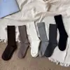 26 calcetines nuevos de algodón peinado transpirables de tubo medio estilo miu para otoño e invierno, calcetines apilados de doble aguja, venta al por mayor con puntera cosida a mano