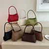 Bolso de mujer con diseño de nicho, bolso de hombro y axila de gran capacidad, nuevo bolso de moda de verano 2026, bolso de mano con patrón tejido