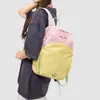 Moda de verano versátil nuevo 2026 color-bloque coreano mochila de viaje para mujeres jóvenes, gran capacidad, se puede usar como bolso de hombro