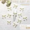 Ins Celebridad de Internet popular resina joyería para uñas al por mayor cinta de color lazo diy corbata de lazo tridimensional accesorios para uñas
