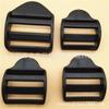 Venta al por mayor de fábrica POM hebilla de cuatro posiciones con arco trasero accesorios para equipaje hebilla trapezoidal curva hebilla hebilla de ajuste para correas