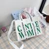 2024 Principios de Primavera Gran Capacidad Lona Letras Mujeres Ligero Casual Simple Bolso de Mano Hombro Cruzado Bolso Tote Nuevo