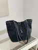 Bolso de axila de diseño retro de nicho transfronterizo para mujer, bolso de mano de lona simple y elegante, bolso de hombro casual y único para el día a día