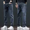 Jeans Masculino 2025 Outono e Inverno Nova Marca de Moda Versátil Elegante Elástico Casual Calça Longa Masculina Reta Slim Fit