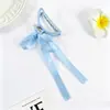 Pinza para el pelo de estilo nuevo transfronteriza, exquisita, estilo dulce, con lazo de cinta, sensación elegante y de alta gama, elegante pinza de tiburón para mujer