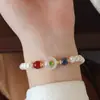 Pulsera elegante de doble círculo de jade y cristal de perla de marea nacional, pulsera de personalidad de nicho, pulsera de moda de alta sensación, venta al por mayor para mujeres