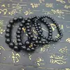 Pulsera de obsidiana cuentas de vidrio negro anillo único pulsera de cuentas de Buda decoración de mano para hombres y mujeres suministro de puesto de lugar escénico venta al por mayor