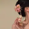 Pin para el cabello rosa puro y etéreo con un diseño fresco de borla estampado en caliente, un nuevo tocado de estilo chino para Hanfu