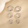 Aretes Artísticos de Anillo de Möbius Lujo Ligero Nueva Tendencia Ola Giro Cuerda Trenzada Tachuelas Aro Sin Perforación Aretes en Capas