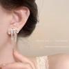 Pendientes de lazo hueco de plata para mujer, aretes de alta gama de nicho de verano, nuevos aretes con diseño de explosiones 2024