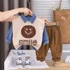 Conjunto de Roupas Masculinas Primavera e Outono 2025 Novo Estilo Coreano Infantil Suéter Colete com Rosto Sorridente Conjunto de Três Peças Tendência Primavera e Outono para Bebê