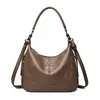 Bolsa Feminina 2026 Novo Estilo Moda Negócios Trabalho Trendy Ombro Único Retrô Grande Capacidade Bolsa de Mão para Mãe Atacado
