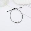 Pulsera de cuero de cuerda negra transfronteriza con colgante de tótem mítico retro cuerda de mano para amantes cuerda de cera tejida a mano simple pulsera tejida a mano venta al por mayor