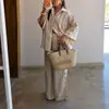 Ins estilo europeo y americano transfronterizo 2026 nueva moda elegante para mujer al por mayor traje de rayas con solapa para ir al trabajo