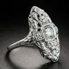 Nuevo Anillo de Topacio y Zafiro Estilo Palacio Exagerado de Lujo Ligero Transfronterizo Europeo y Americano Huajie con Accesorios de Patrón Hueco