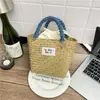 Bolso de Mano de Bloques de Color Estilo Coreano 2026 Bolso de Cesta de Paja Bolso Tejido a Mano para Vacaciones en la Playa Bolsos para Mujer