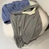 Camiseta elegante, suave y cómoda de algodón con cuello redondo y manga larga para mujer, con corte relajado, diseño versátil y color liso, perfecta como prenda básica para superponer.