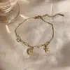 Acero de titanio carcasa que no se decolora diseño de estrella de mar tobillera dorada cadena de fútbol para mujer cadena de tobillo accesorios de lujo de alta gama de verano