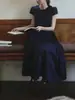 Vestido de manga corta con cuello redondo, encaje de Auricularia en la cintura, estilo retro, femenino, línea A, azul marino inglés