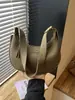 Bolso de hombro elegante y casual, nuevo bolso de hombro tejido de color liso, bolso tote moderno y versátil, bolso en forma de media luna, al por mayor