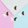 Al por mayor Versión Coreana Creativo Doble Colgante Patrón de Mariposa Blanco y Negro Goteo de Aceite Pulsera de Aleación Collar Colgante Joyería Accesorios DIY