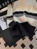 Tejido de punto a rayas estilo coreano perezoso para hombre, nuevo suéter grueso de cuello redondo para otoño e invierno, chaqueta holgada casual para pareja