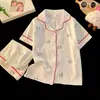 Pijama Infantil Feminino Verão 2026 Novo Algodão Nuvem Doce Fino Manga Curta Shorts Crianças Pequenas, Médias e Grandes Roupas de Casa