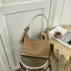 Bolso de mano de alta costura con patrón tejido Shuai Mi Jia, simple y único, elegante para el trabajo y los desplazamientos, de hombro y de mano