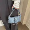 2026 Elegante Color Sólido Personalizado Punk Remache Hebilla de Cinturón Moda Cadena Decorada Bolso de Hombro Cruzado para Mujer