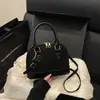 Bolso vintage transfronterizo para mujer 2026 nuevo moda europea y americana estampado de leopardo bolso de mano versátil de gran capacidad tipo concha para mujer