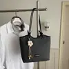 Bolso de mano para mujer transfronterizo 2026 nuevo y elegante bolso de hombro, bolso cruzado tipo cubo de moda versátil