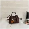 Bolsa de ombro e transversal retro estilo coreano para mulheres, nova bolsa tipo balde estilosa e única, acabamento fosco