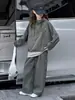 Conjunto de Ropa para Niñas Primavera y Otoño 2026 Estilo Nuevo Sudadera con Capucha Falsa de Dos Piezas y Pantalones de Pierna Ancha para Niños Mayores, Moderno y Genial