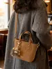 Bolso Versátil Transfronterizo para Mujer Otoño e Invierno 2026 Nuevo Bolso de Hombro Cruzado Mate Retro Bolso de Mano Popular Bolso Cubo
