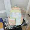 Mochila de gran capacidad con temática de dibujos animados para estudiantes de secundaria y preparatoria, un diseño nuevo y lindo con una apariencia elegante.