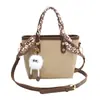Bolsas de Diseño Nicho para Mujer 2025 Nuevo Bolso de Hombro Versátil Bolso Cruzado Moda Color de Contraste Bolso Cubo Portátil Venta al por Mayor