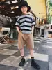 Camiseta de Manga Corta a Rayas para Niños 2026 Verano Nuevo Estilo Top Suelto y Suave de Media Manga con Cuello Redondo para Niños Medianos y Grandes