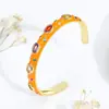 Europa y Estados Unidos pulsera abierta multicor de cobre pesado incrustada con circonita de color de industria pesada pulsera de aceite de gota de alto sentido de lujo ligero venta al por mayor